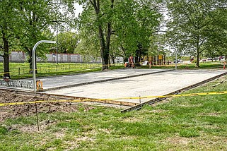 Julie Smith/News Tribune photo: 
Jefferson City Parks and Rec crews have prepared the site of the old basketball court at the East Miller Street Park for new concrete to be poured soon. New posts have also been installed for the concrete surface.